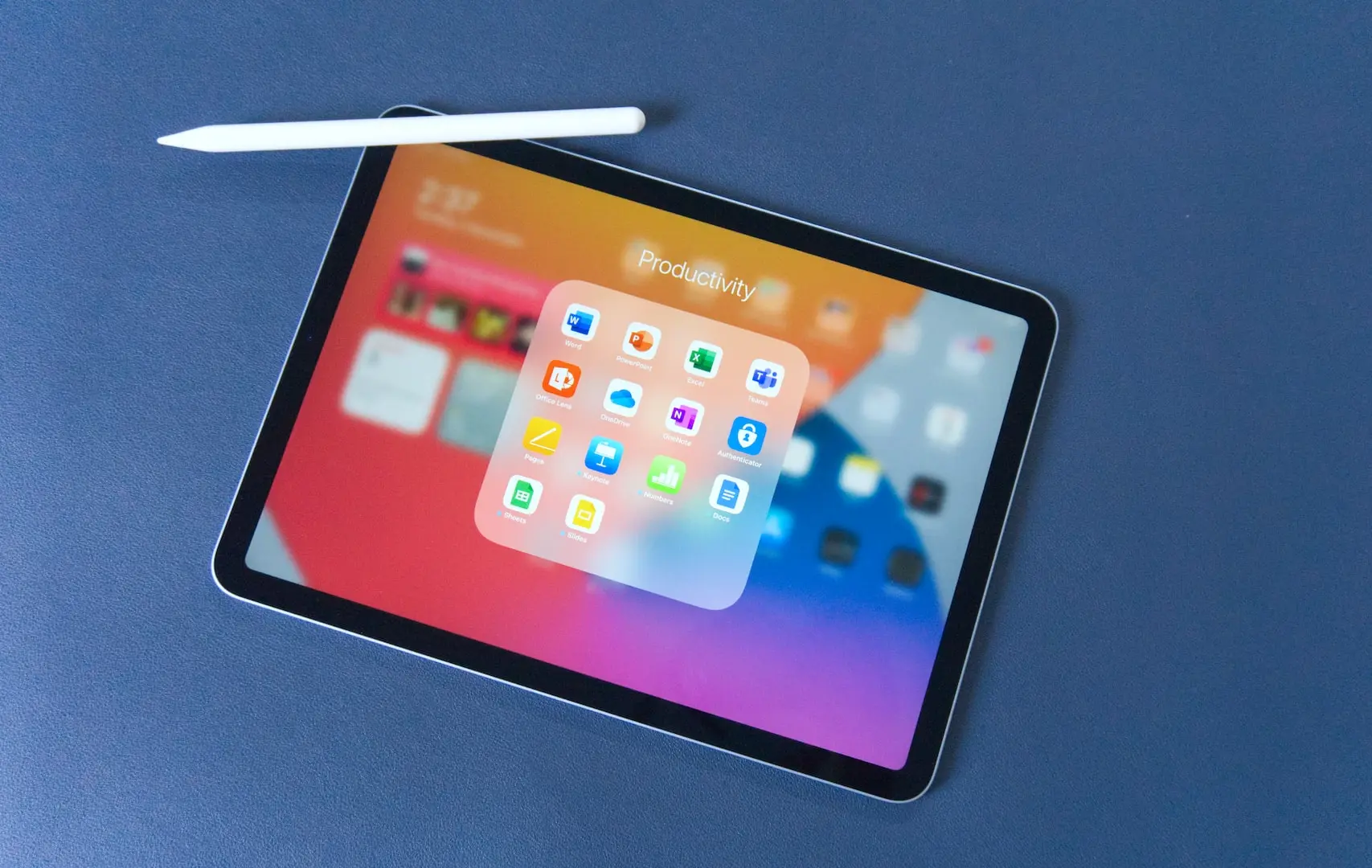 black tablet computer on black table